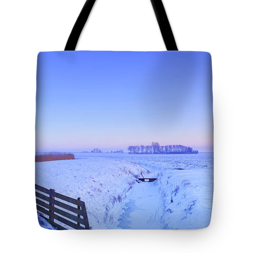 North Holland Tote Bag featuring the photograph Traditional Dutch Windmills In Winter by Sara winter