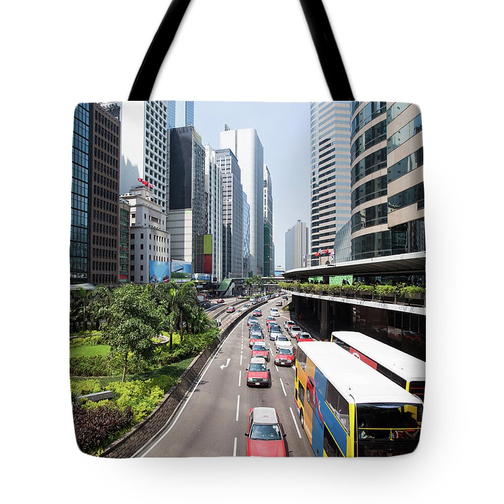Downtown District Tote Bag featuring the photograph Traffic Jam In Hong Kong Central by Matteo Colombo