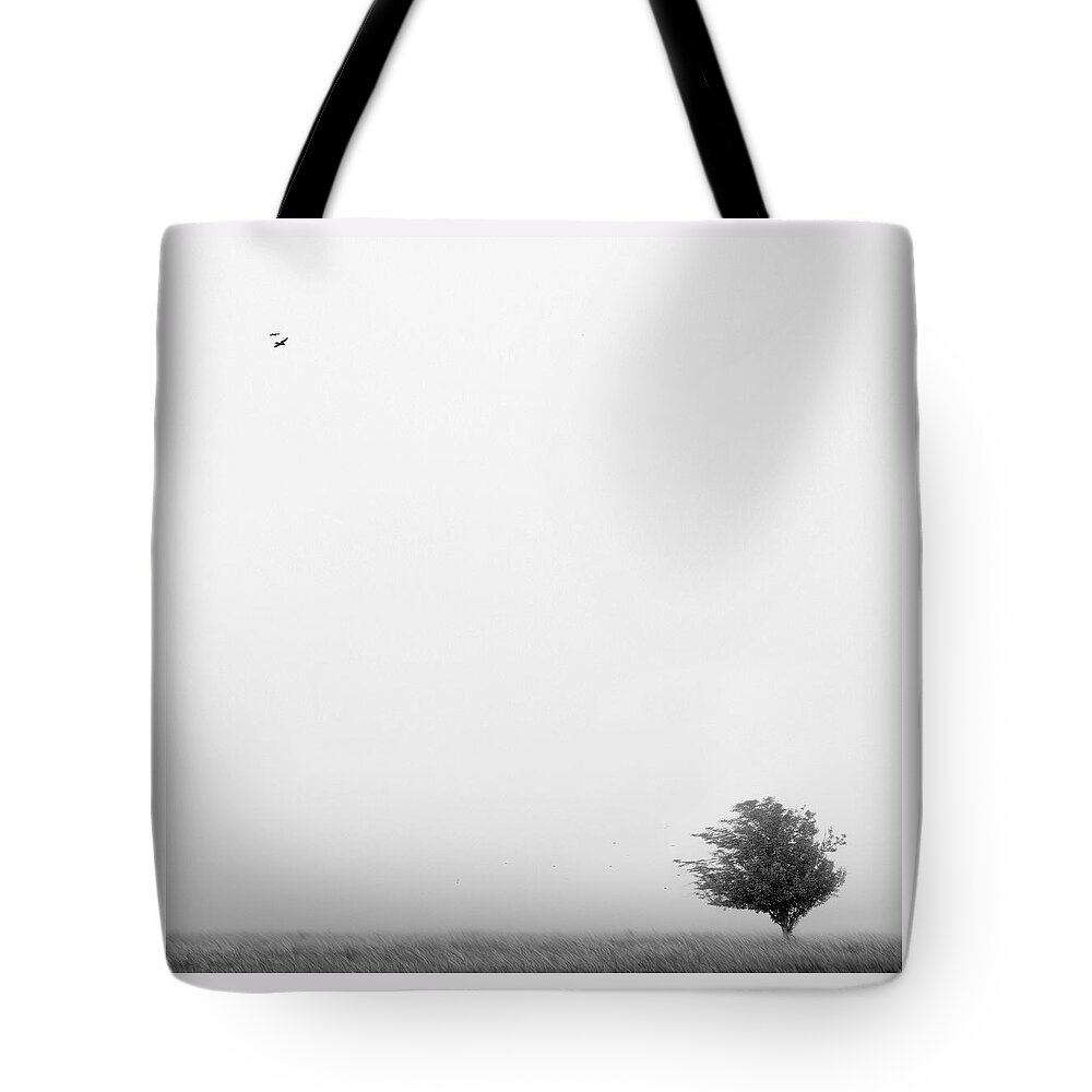 Landscape Tote Bag featuring the photograph Tree in the Wind by Mike McGlothlen