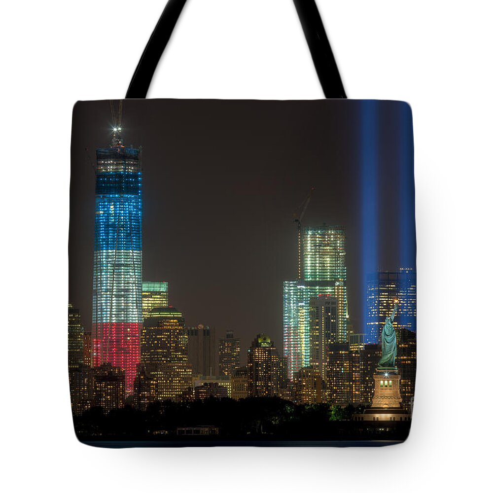 Clarence Holmes Tote Bag featuring the photograph Tribute in Light XIII by Clarence Holmes