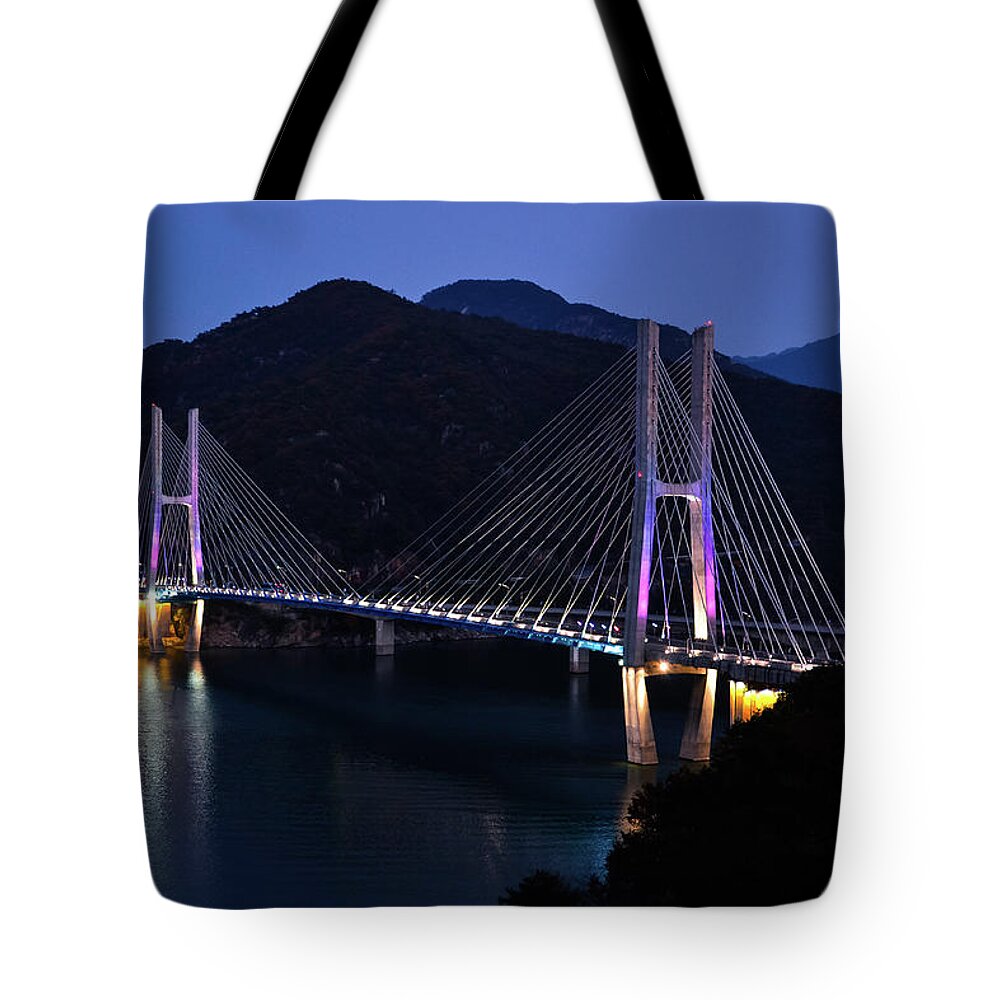 Tranquility Tote Bag featuring the photograph Twilight Bridge by Amaya Williams
