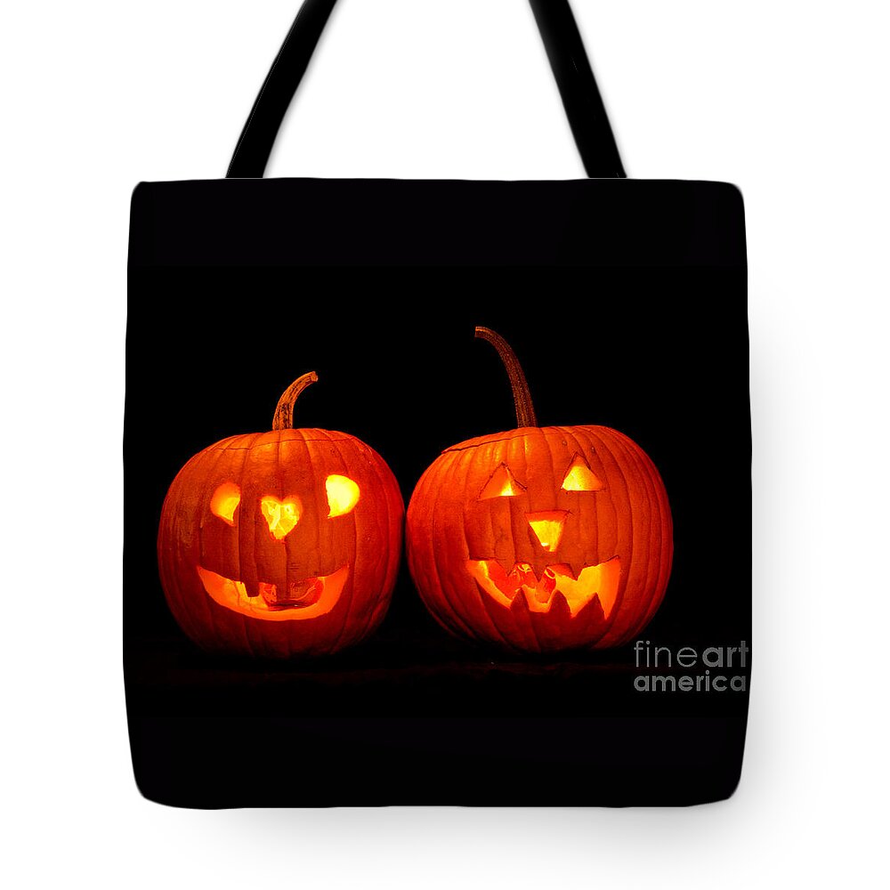Halloween Tote Bag featuring the photograph Two Carved Jack O Lantern Pumpkins by James BO Insogna