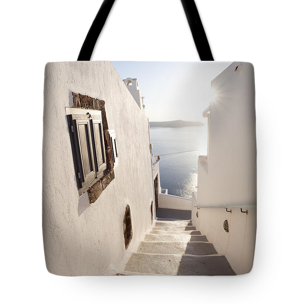 Architecture Tote Bag featuring the photograph Typical steps downhill in small greek village Santorini Greece by Matteo Colombo