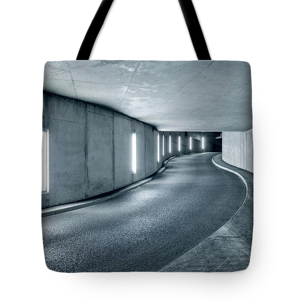 Empty Tote Bag featuring the photograph Underground Parking Garage by Jorg Greuel