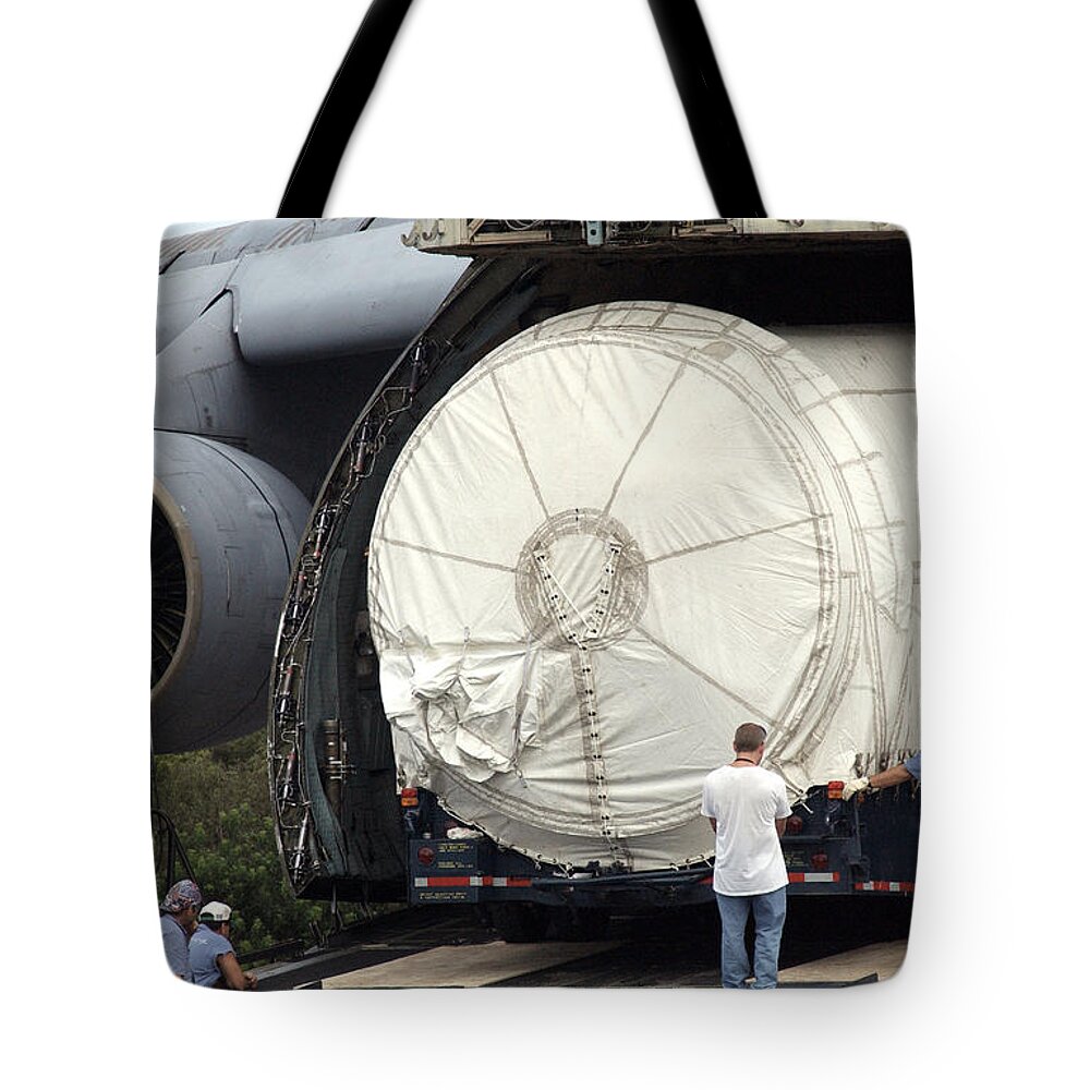 Astronomy Tote Bag featuring the photograph Unloading A Titan Ivb Rocket by Science Source