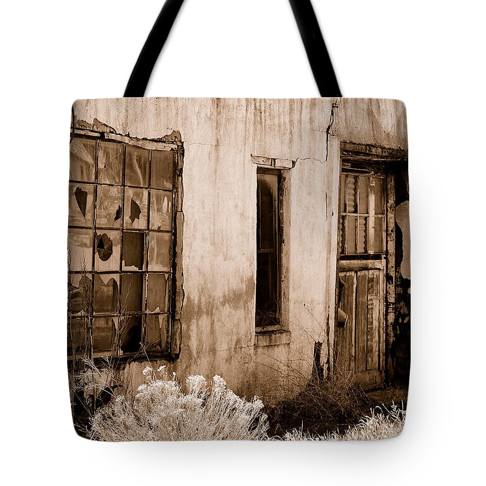 Vacant Business Building Abandoned Run Down Glass Downey Idaho Id Tote Bag featuring the photograph Vacancy by Holly Blunkall