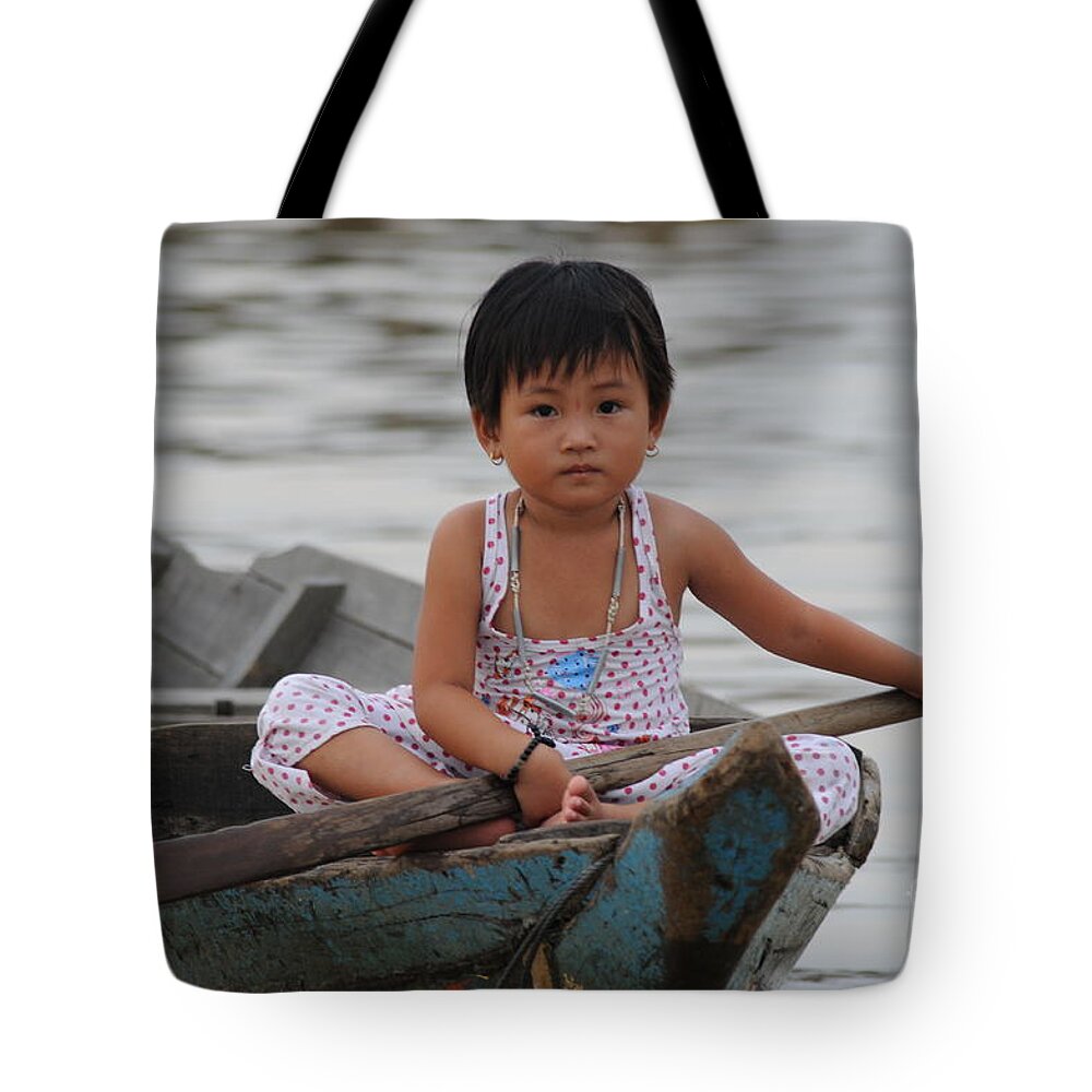 Vietnamese Girl Tote Bag featuring the photograph Vietnamese Girl on Lake Tonle Sap by Vivian Christopher