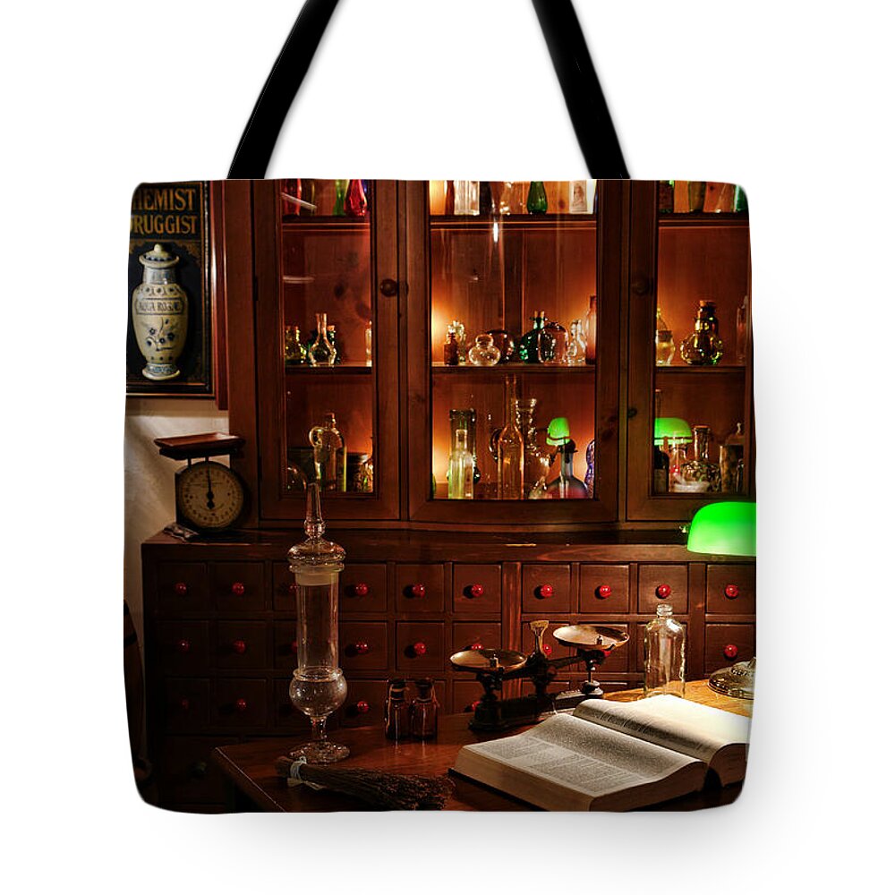 Apothecary Tote Bag featuring the photograph Vintage Apothecary Shop by Olivier Le Queinec