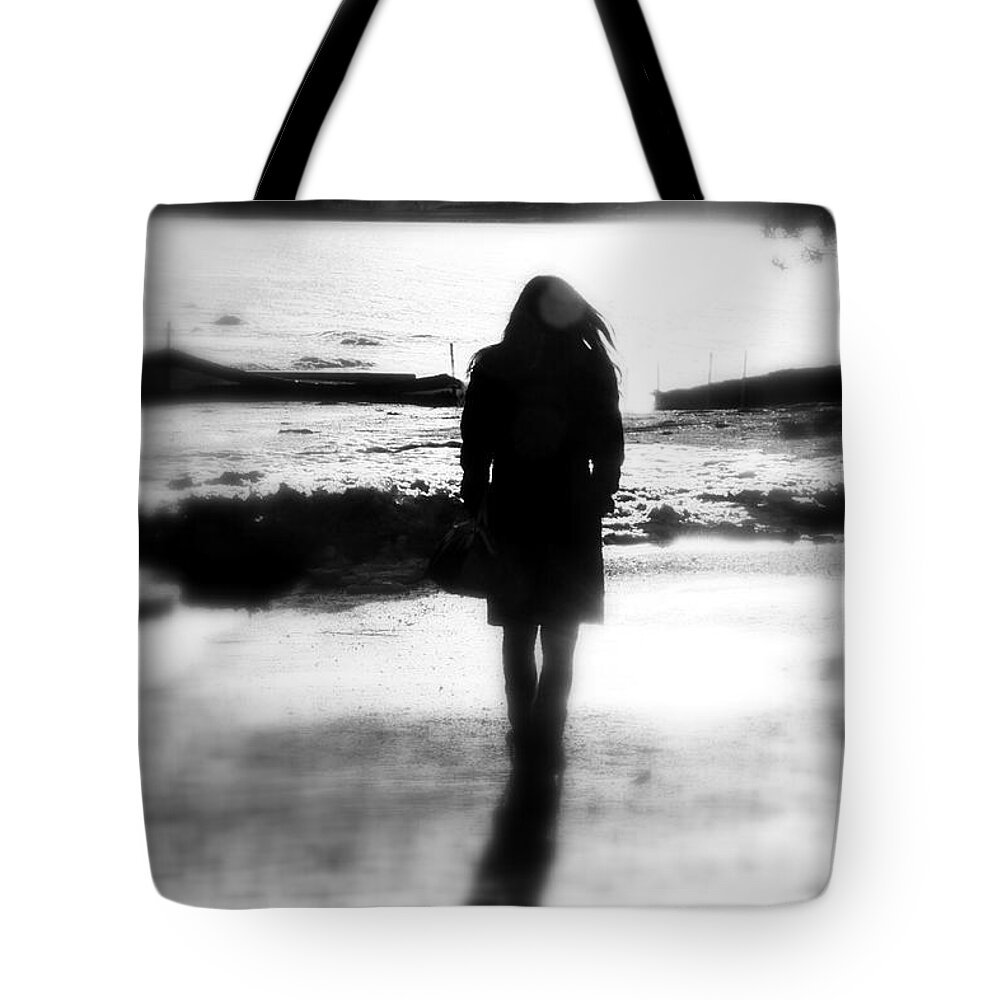 Woman Tote Bag featuring the photograph Walking Alone by Valentino Visentini