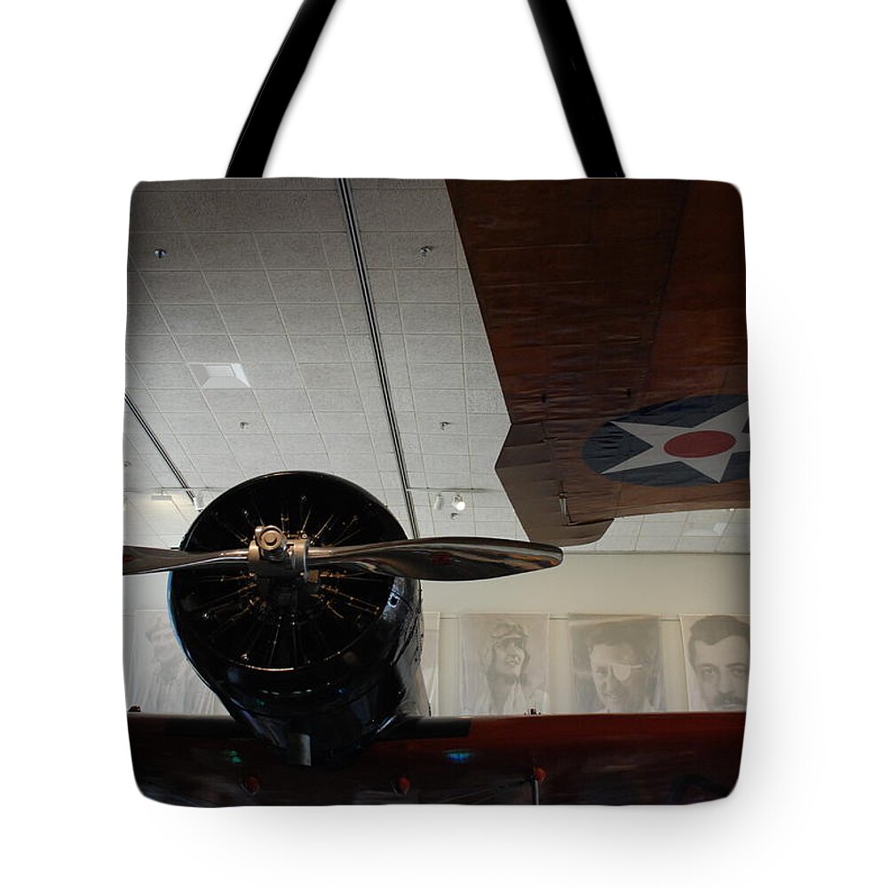 Aviators Tote Bag featuring the photograph Wall of Great Aviators by Kenny Glover