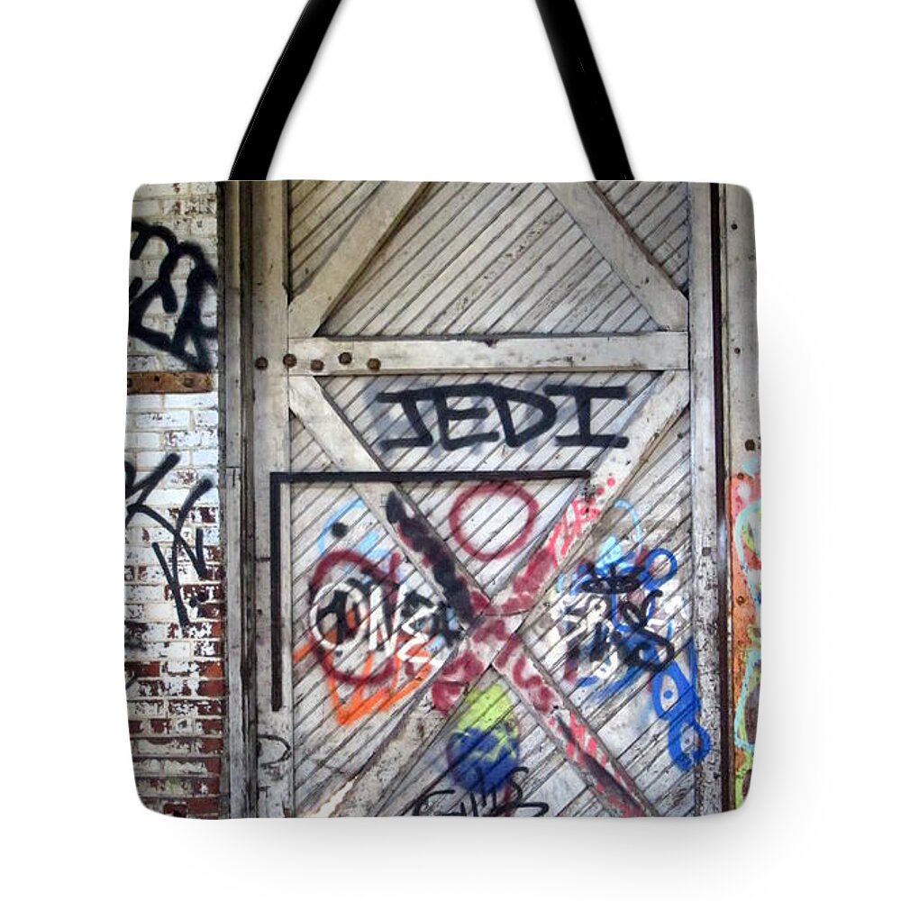 Abandoned Tote Bag featuring the photograph Warehouse Door Graffiti JEDI by Anita Burgermeister