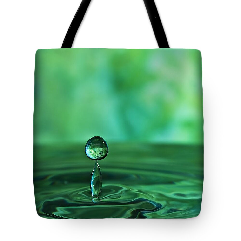 Water Tote Bag featuring the photograph Water Drop Green by Linda Blair