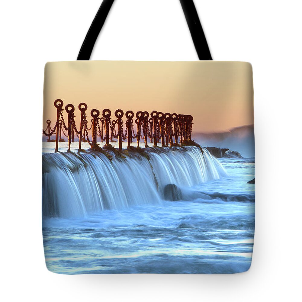 Scenics Tote Bag featuring the photograph Water Flowing Over Wall Of Newcastle by Ben Ivory