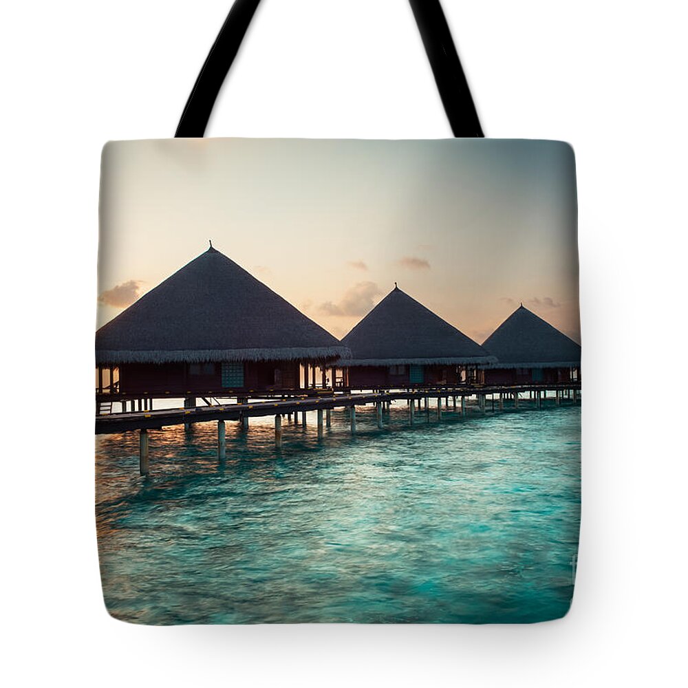 Amazing Tote Bag featuring the photograph Waterbungalows At Sunset by Hannes Cmarits