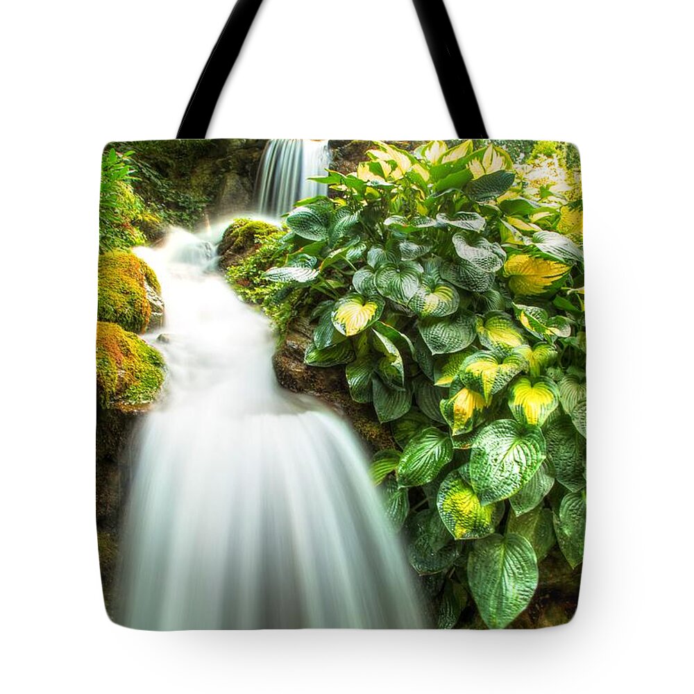 Flow Tote Bag featuring the photograph Waterfall in the hosta by Eti Reid