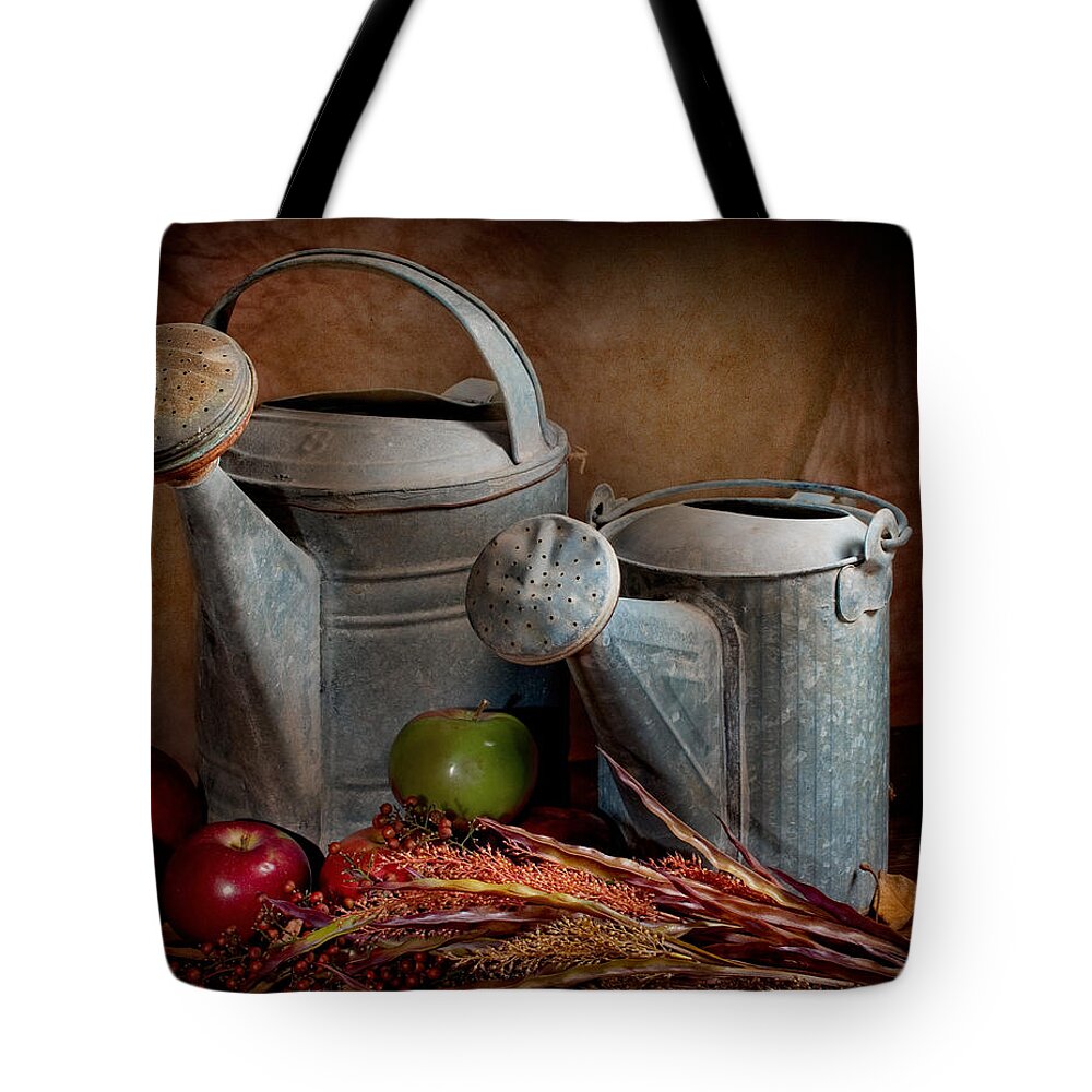 Watering Can Tote Bag featuring the photograph Watering Cans by David and Carol Kelly