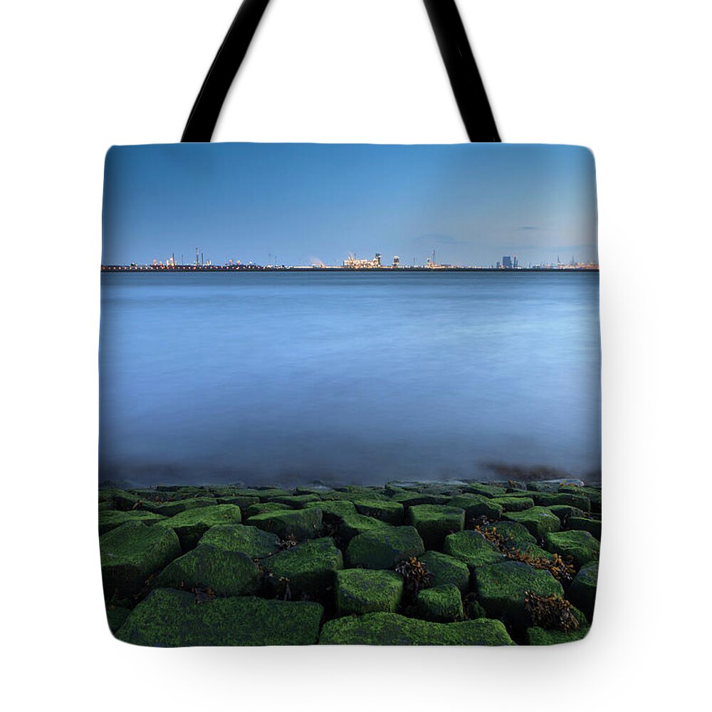 Industrial District Tote Bag featuring the photograph Waves Breaking On A Breakwater by Gaps