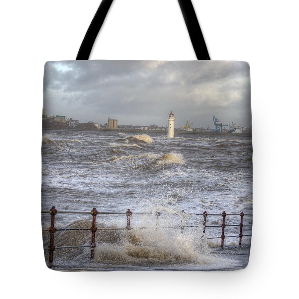 Lighthouse Tote Bag featuring the photograph Waves On The Slipway by Spikey Mouse Photography