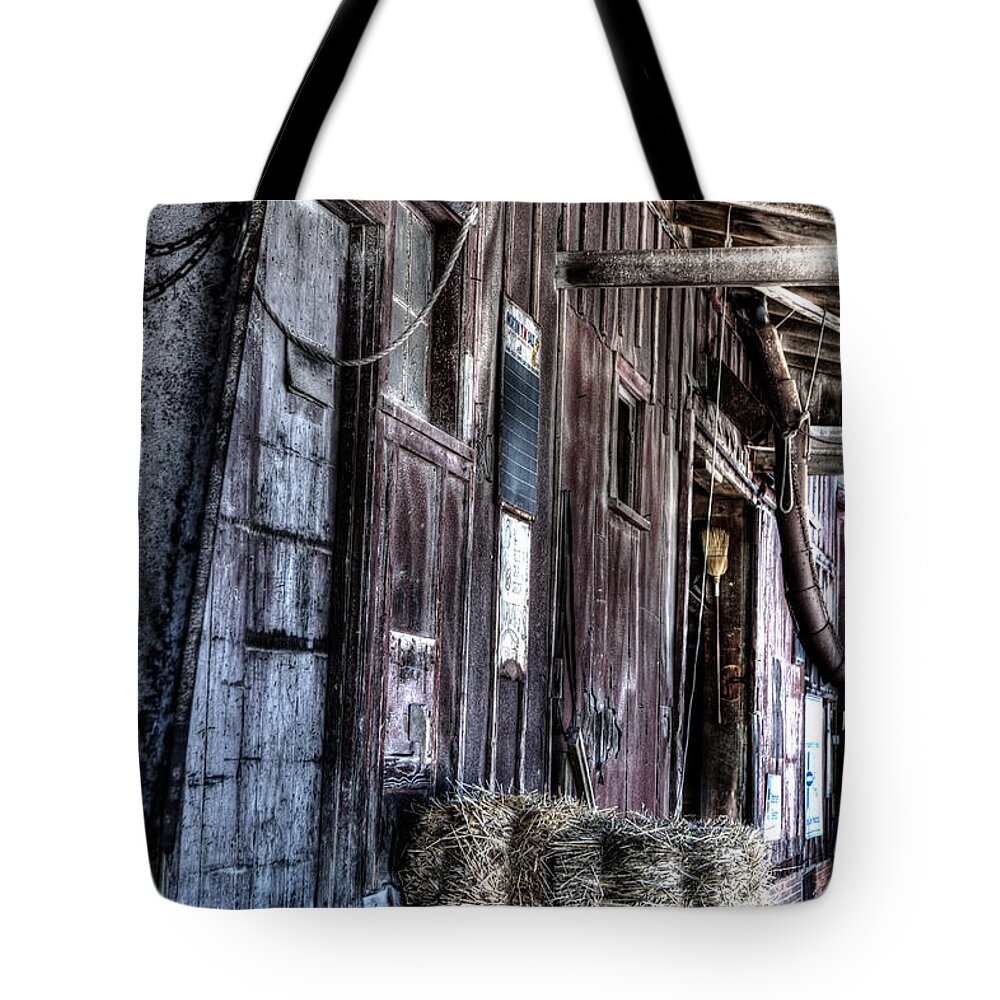 Grant Tote Bag featuring the photograph Wayne Feed by Evie Carrier