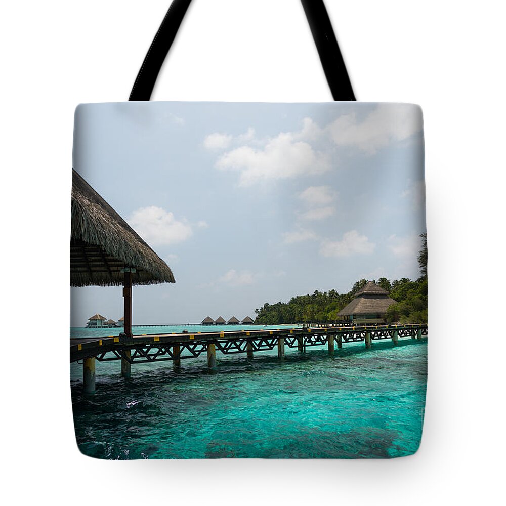 Amazing Tote Bag featuring the photograph Welcome To Paradise by Hannes Cmarits