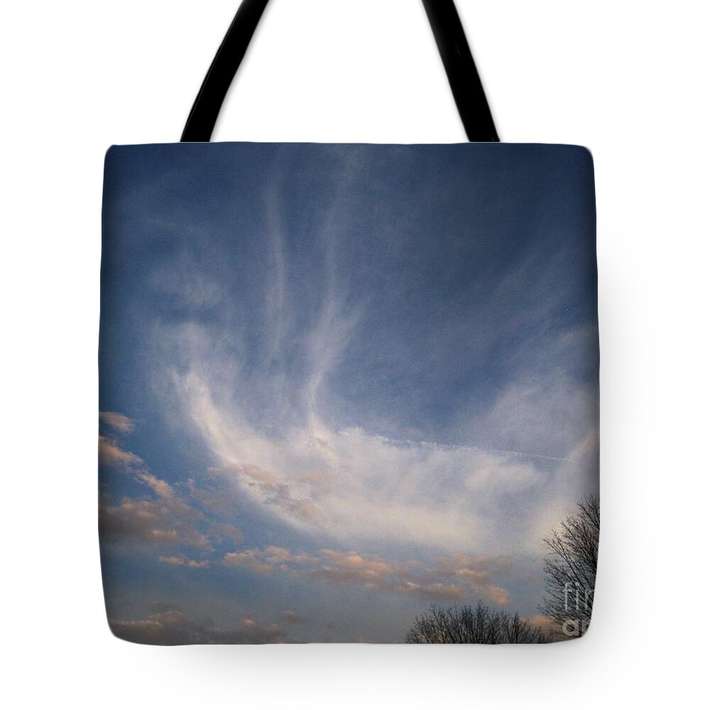 Cloud Formation Of Face Tote Bag featuring the photograph Where does the wind come from by Kristine Nora