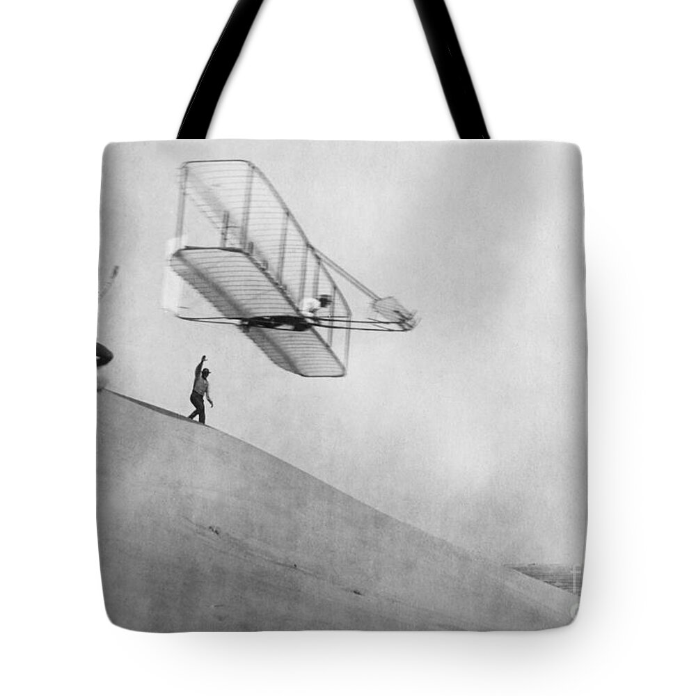 History Tote Bag featuring the photograph Wilbur Wright Pilots Early Glider 1901 by Science Source