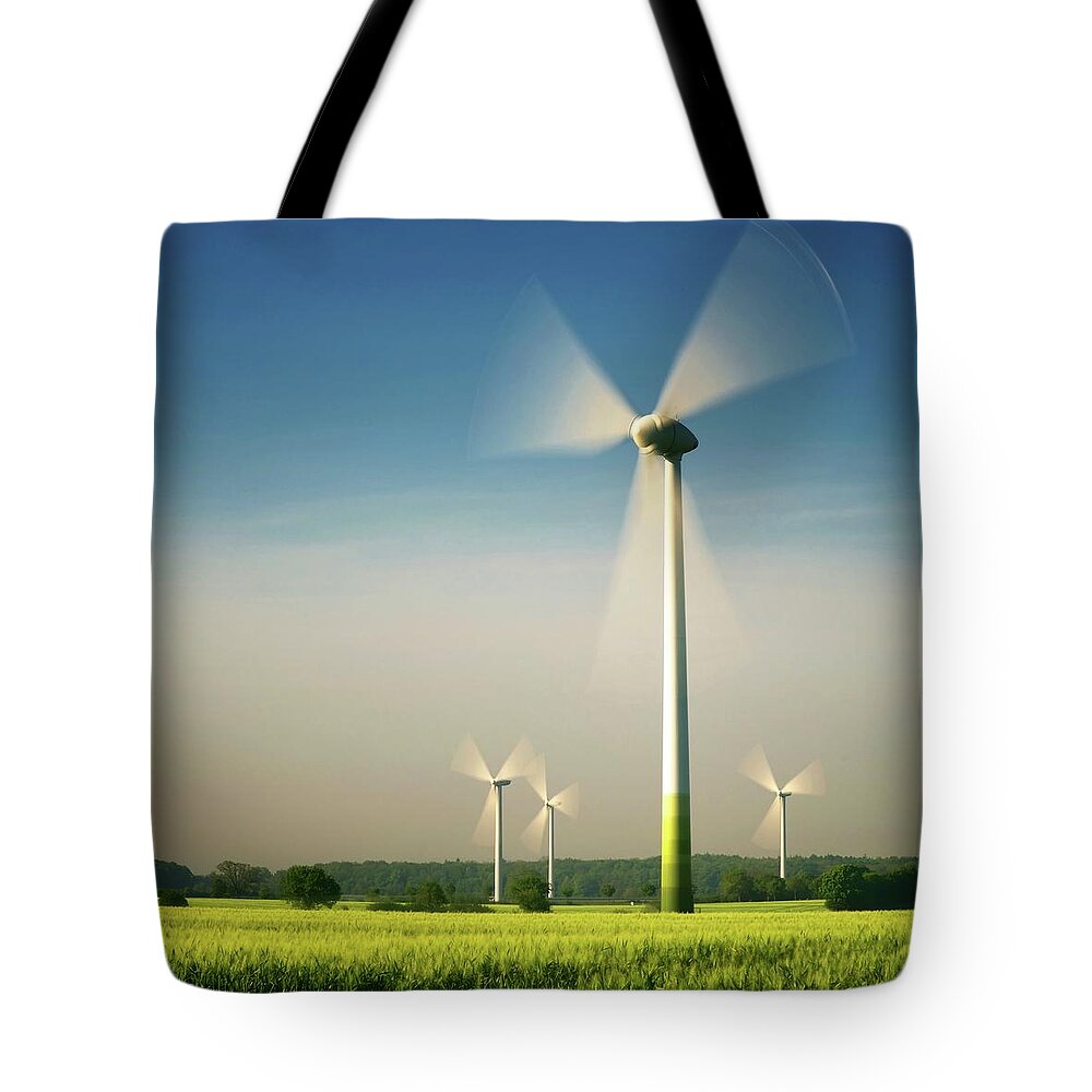 Motion Tote Bag featuring the photograph Wind Turbines by Siegfried Haasch