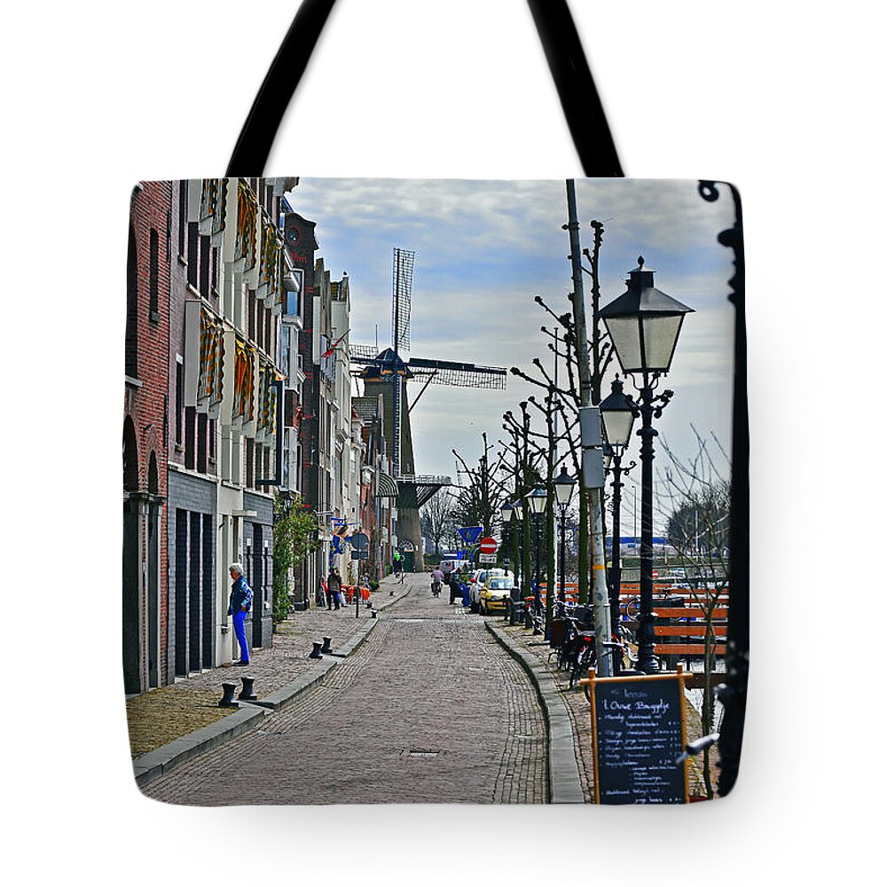 Travel Tote Bag featuring the photograph Windmill at the End of the Street by Elvis Vaughn
