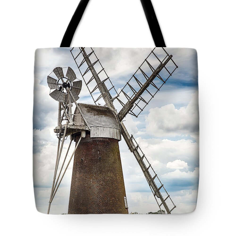 Windmill Tote Bag featuring the photograph Windmill in Norfolk UK by Simon Bratt