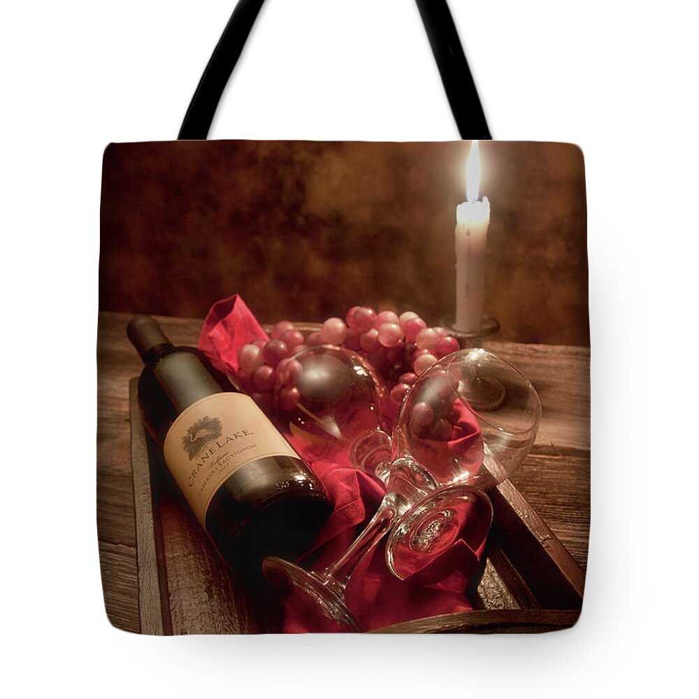 Alcohol Tote Bag featuring the photograph Wine by Candle Light I by Tom Mc Nemar