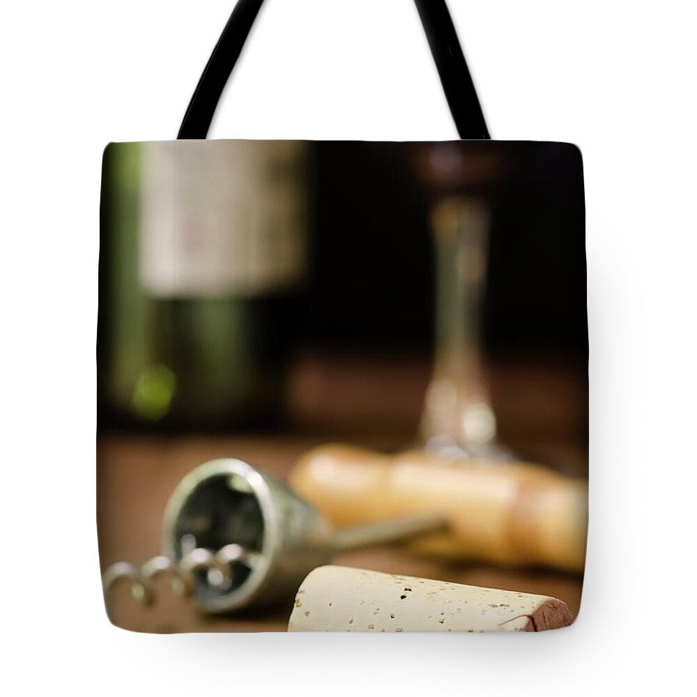Corkscrew Tote Bag featuring the photograph Wine Cork, Corkscrew, Wineglass, And by 1morecreative