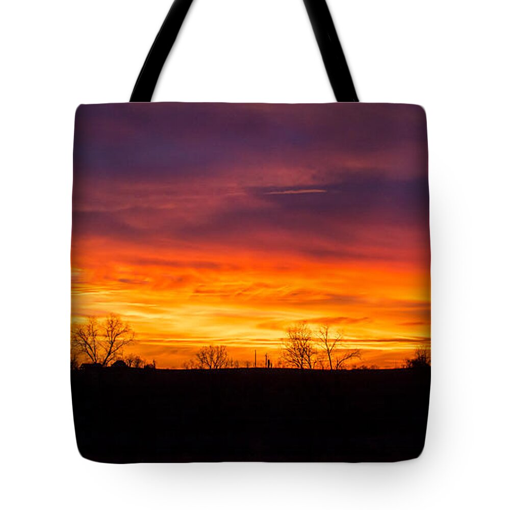 Sunset Tote Bag featuring the photograph Within the Clouds by Holden The Moment