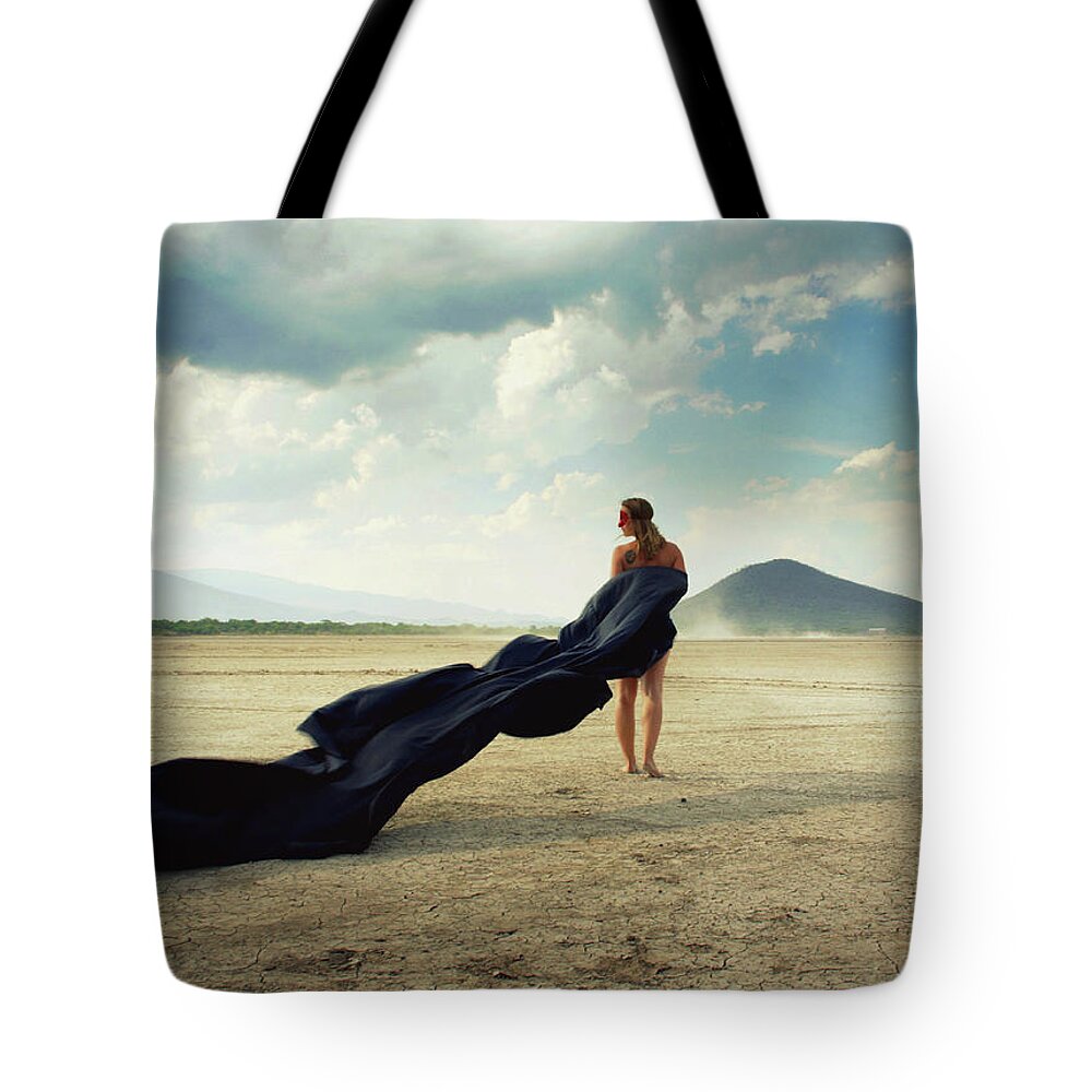 Wind Tote Bag featuring the photograph Woman With Long Dress by Saul Landell / Mex
