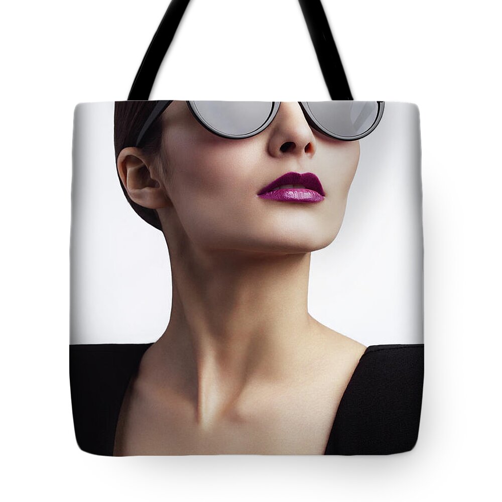 Cool Attitude Tote Bag featuring the photograph Woman With Trendy Eyewear by Lambada
