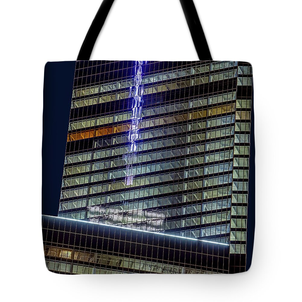 World Trade Center Tote Bag featuring the photograph World Trade Center Mast Reflection by Susan Candelario