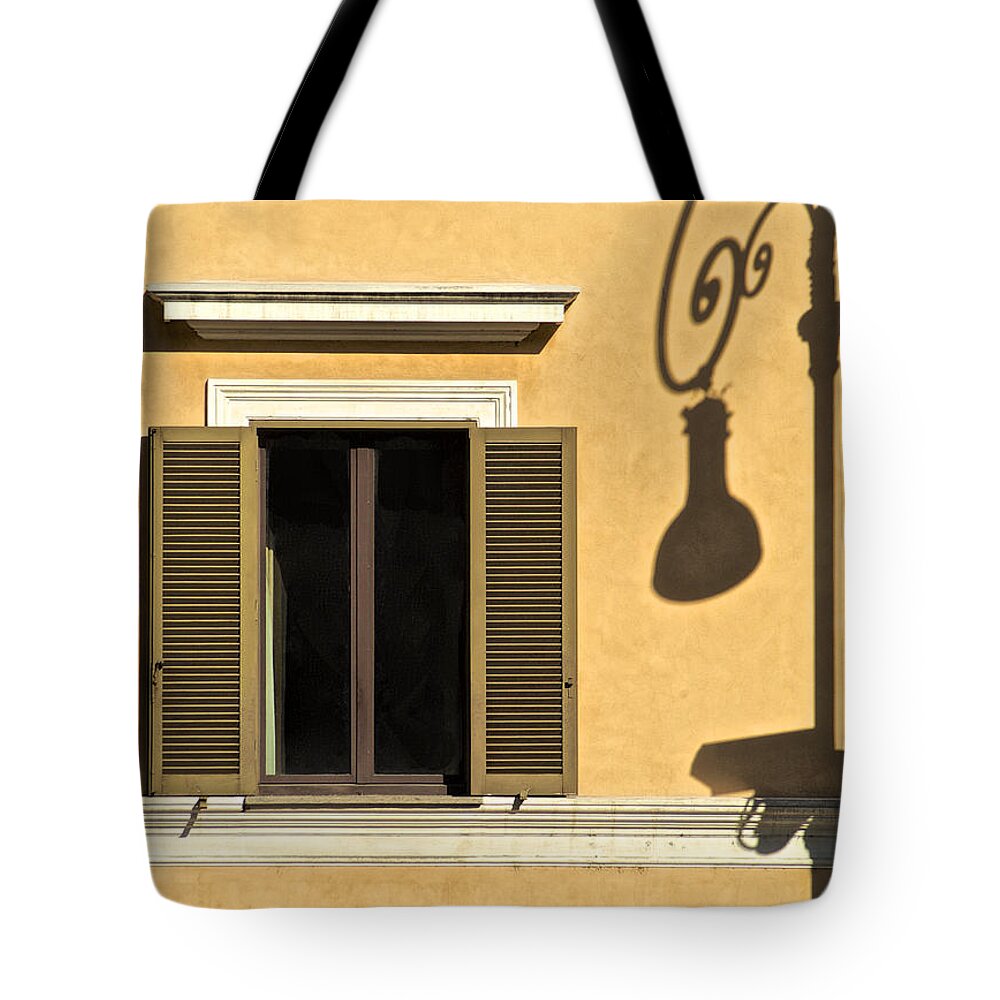 Light Post Tote Bag featuring the photograph Wrought Iron Street Lamp Shadow of Ancient Rome by David Letts
