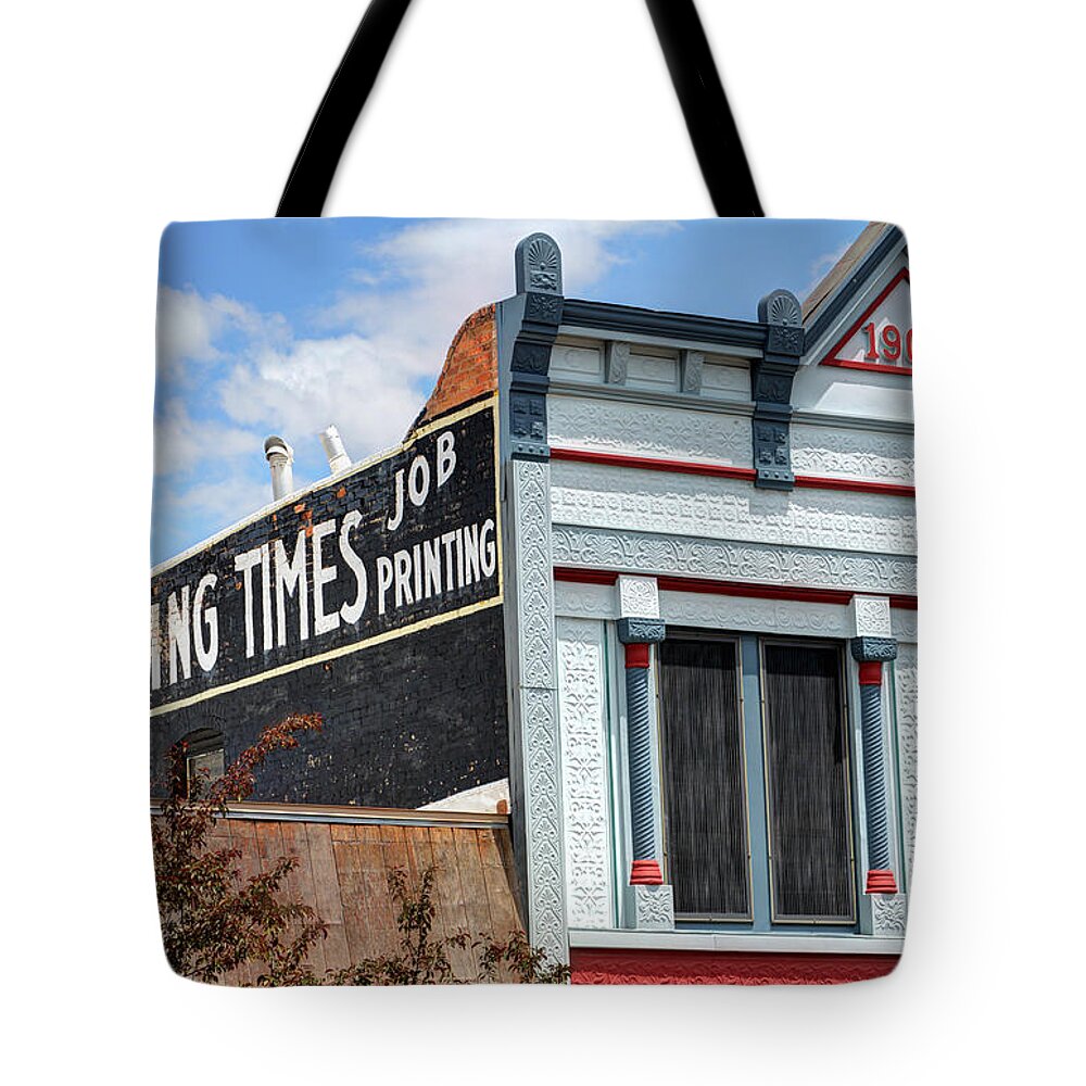Wyoming Tote Bag featuring the photograph Wyoming Times Historic Newspaper Ghost Sign by Gary Whitton