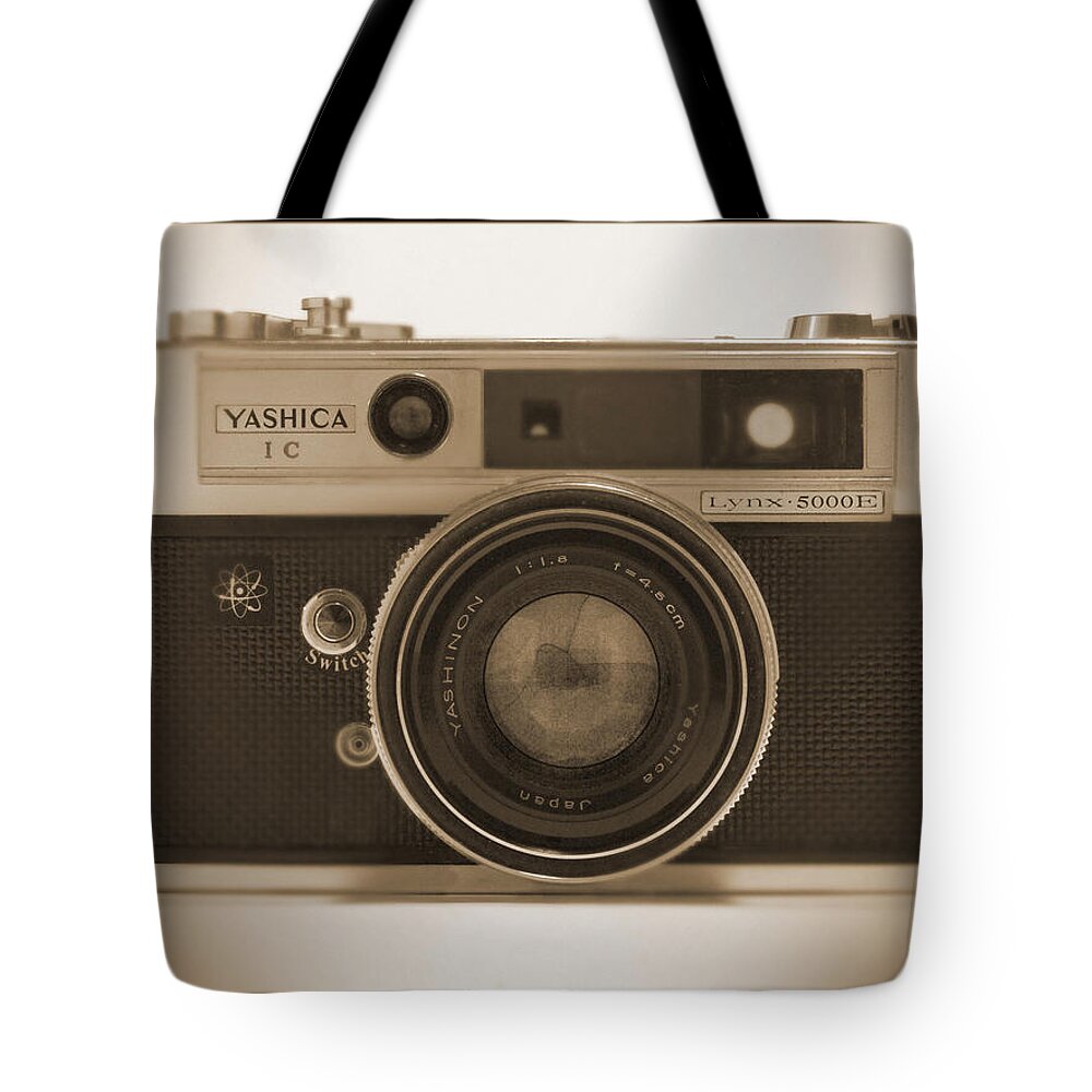 Classic Film Camera Tote Bag featuring the photograph Yashica Lynx 5000E 35mm Camera by Mike McGlothlen