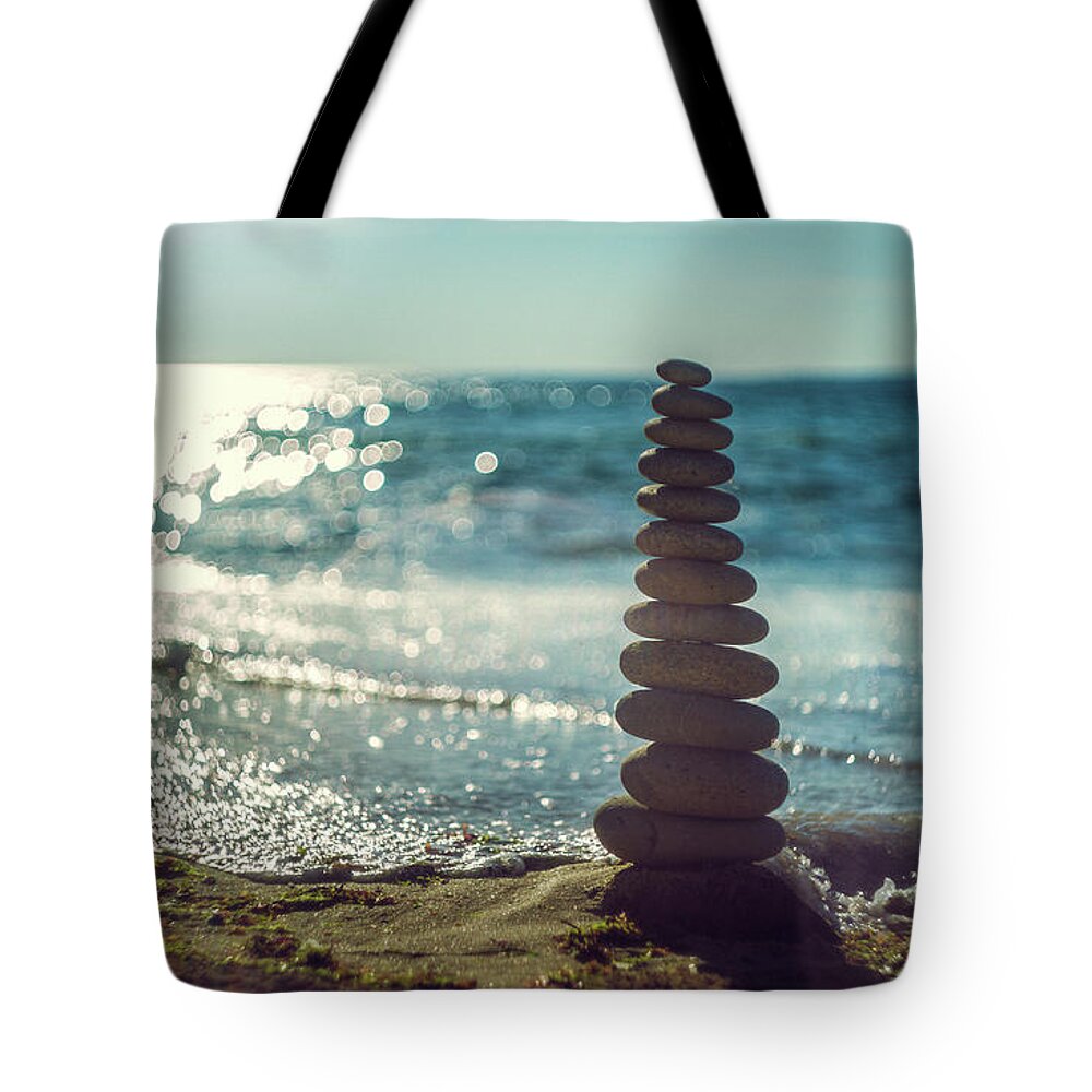 Tranquility Tote Bag featuring the photograph Zen Stones Beach Sunset by Chris Dève
