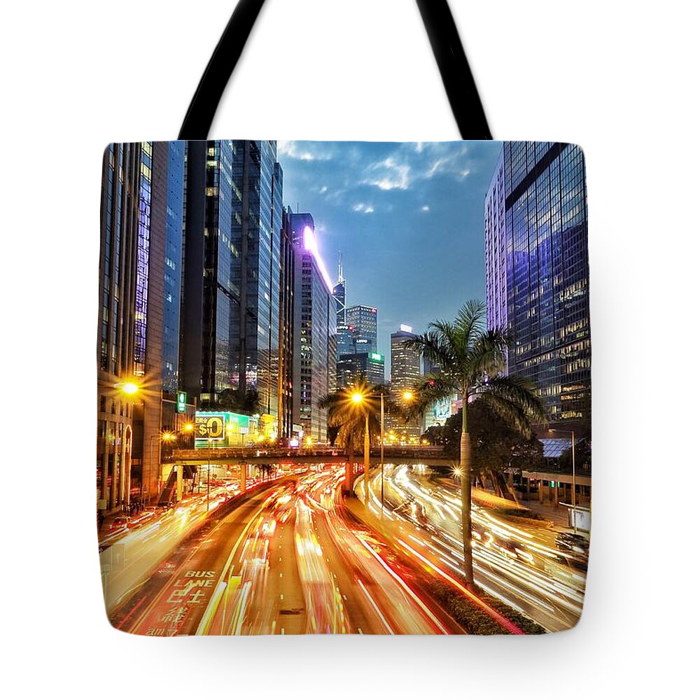 Wanchai Tote Bag featuring the photograph Zoom by Petersillitoe