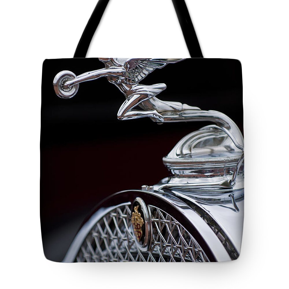 1931 Packard Deluxe Eight Roadster Tote Bag featuring the photograph 1931 Packard Deluxe Eight Roadster Hood Ornament by Jill Reger