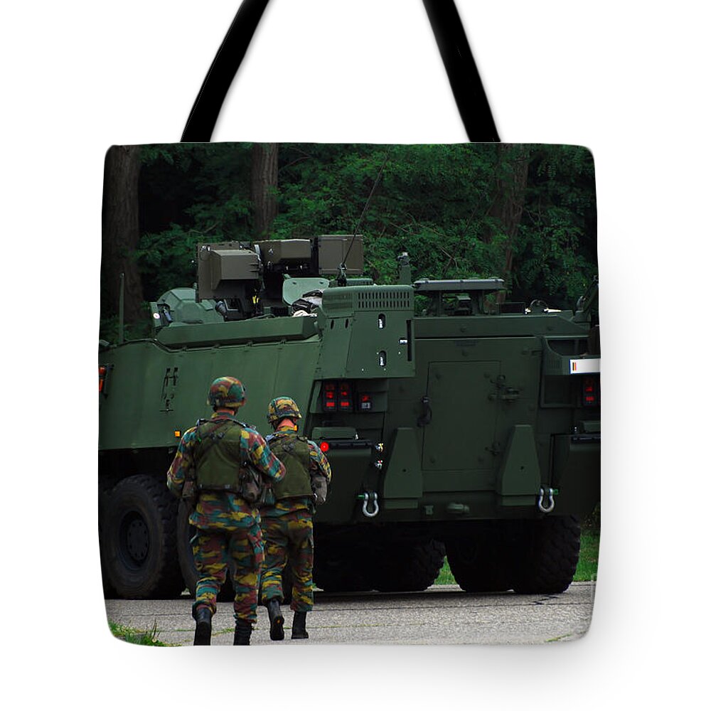Military Tote Bag featuring the photograph Belgian Infantry Soldiers Walk #1 by Luc De Jaeger