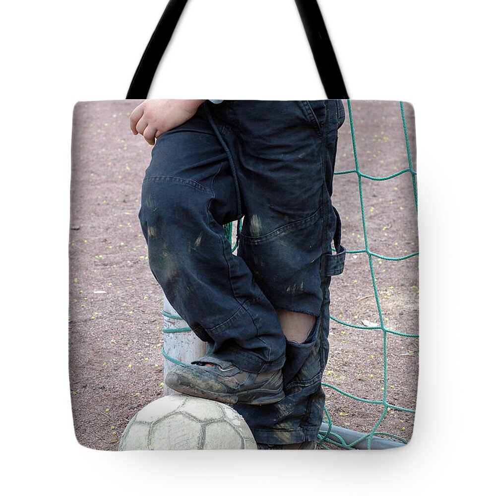 Ball Tote Bag featuring the photograph Boy with soccer ball by Matthias Hauser