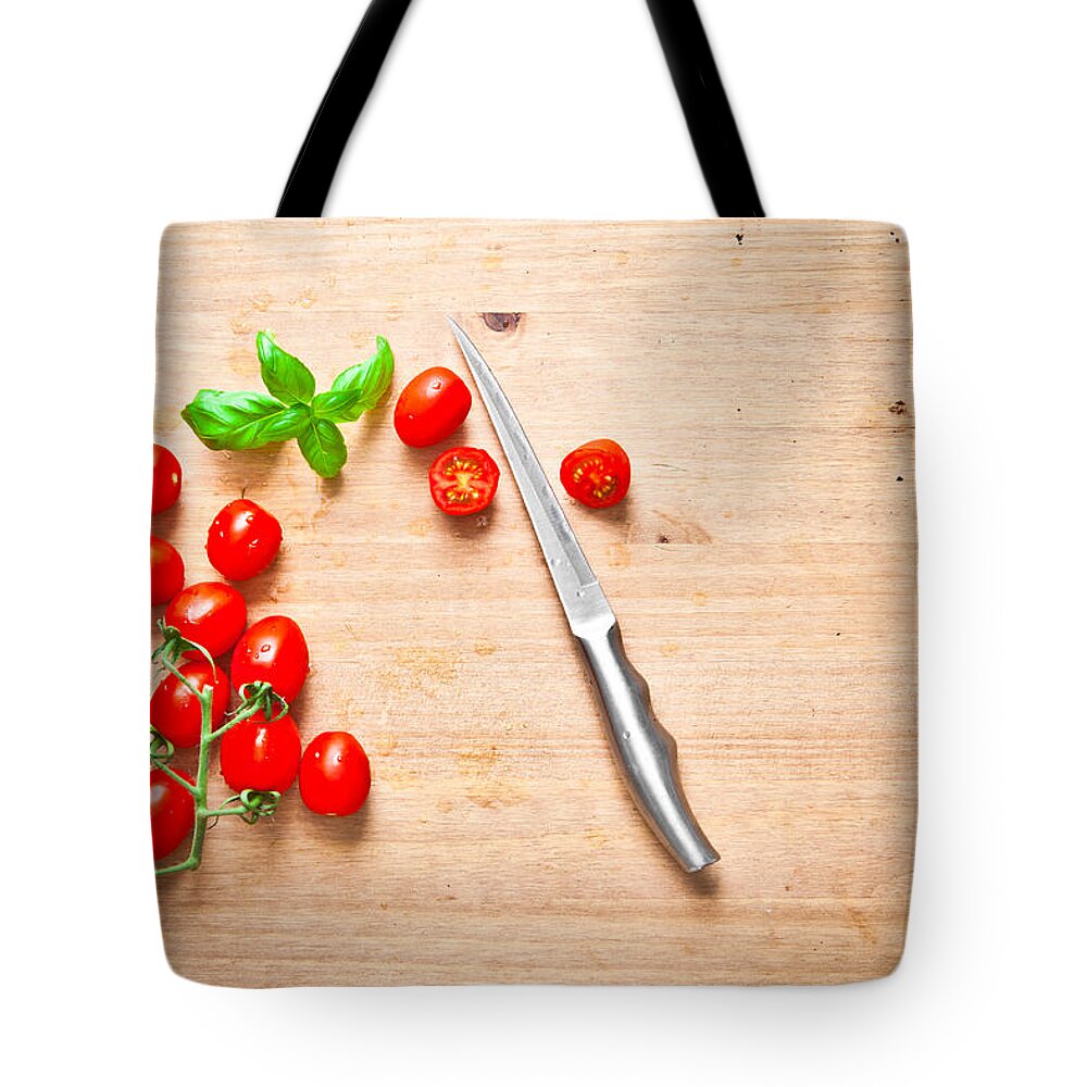 Aromatic Tote Bag featuring the photograph Cherry tomatoes #1 by Tom Gowanlock