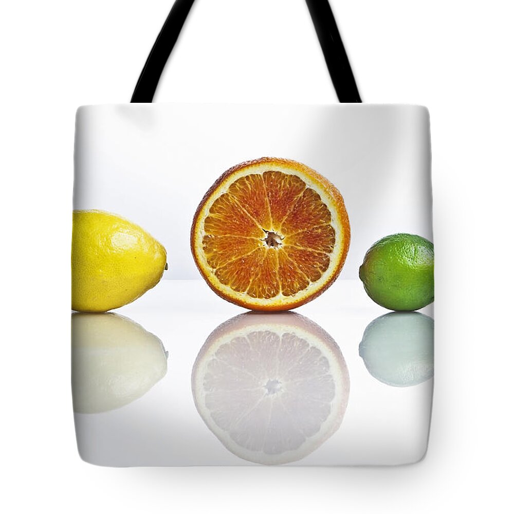 Citrus Fruits Tote Bag featuring the photograph Citrus Fruits #1 by Joana Kruse