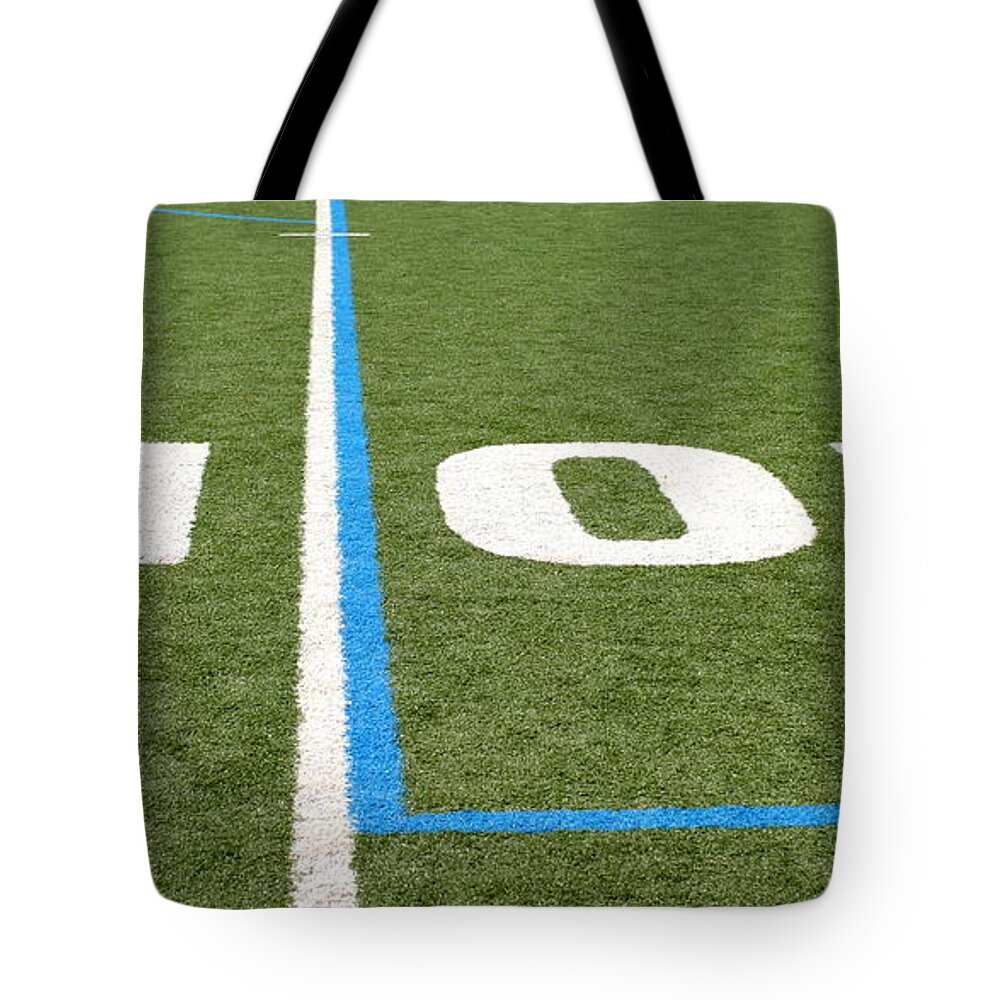 American Tote Bag featuring the photograph Football Field Ten #1 by Henrik Lehnerer