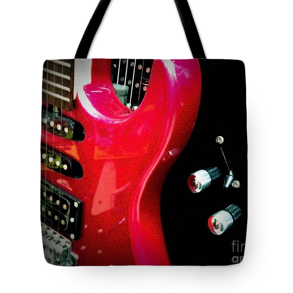 Music Tote Bag featuring the photograph Guitars #1 by Eena Bo