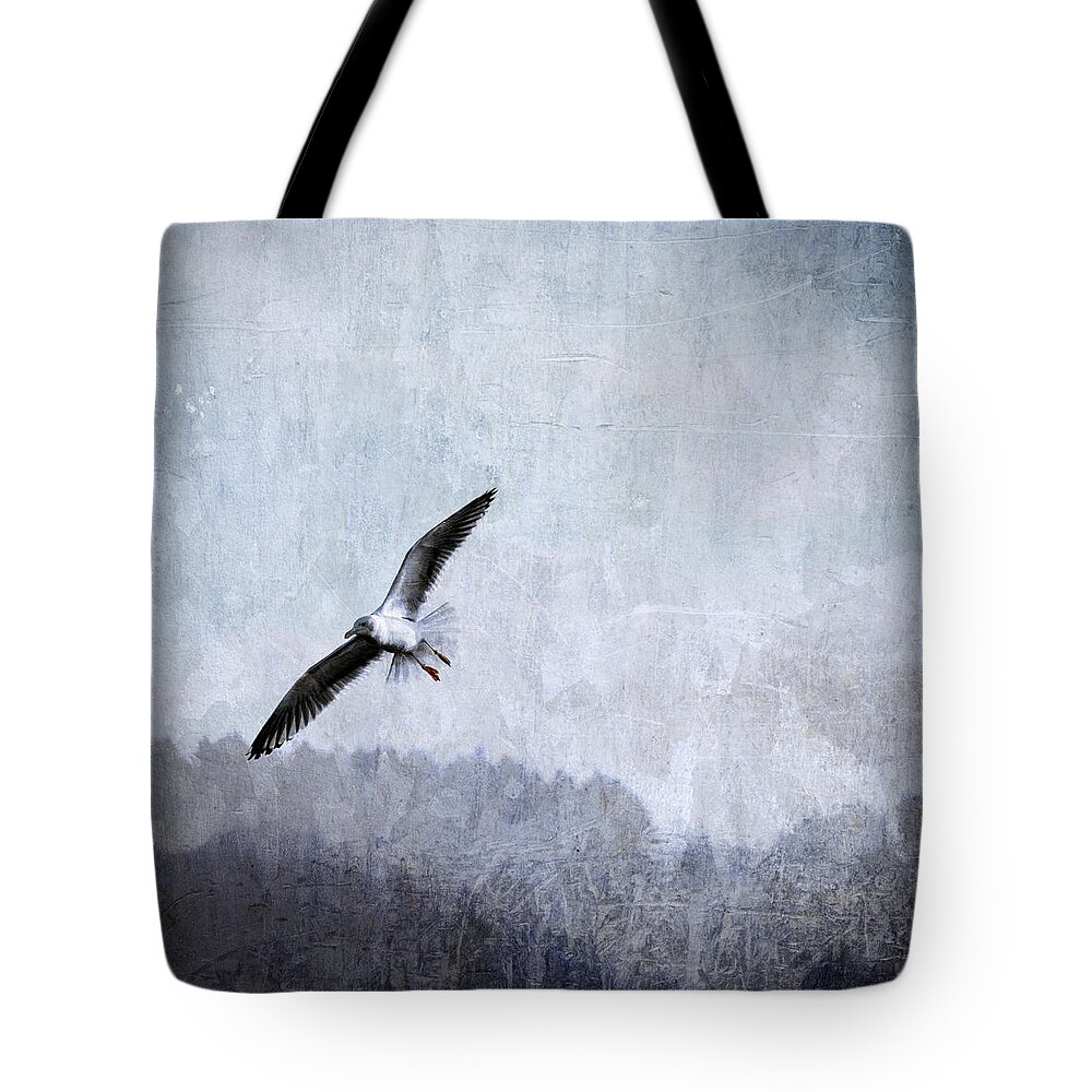 Seagull Tote Bag featuring the photograph Soaring Seagull by Carol Leigh