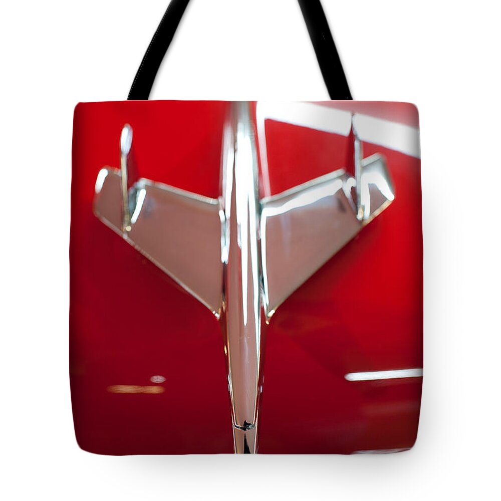 1955 Bel Air Tote Bag featuring the photograph 1955 Chevy Belair Hood Ornament by Sebastian Musial