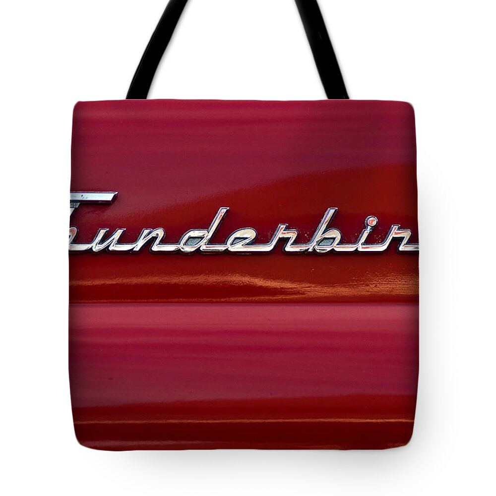1955 Ford Thunderbird Tote Bag featuring the photograph 1955 Ford Thunderbird Rear Tail Emblem by Onyonet Photo studios